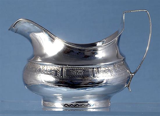 A George III Irish silver sugar bowl and cream jug, maker possibly Robert Breading, bowl length 210mm, weight 12oz/375grms.